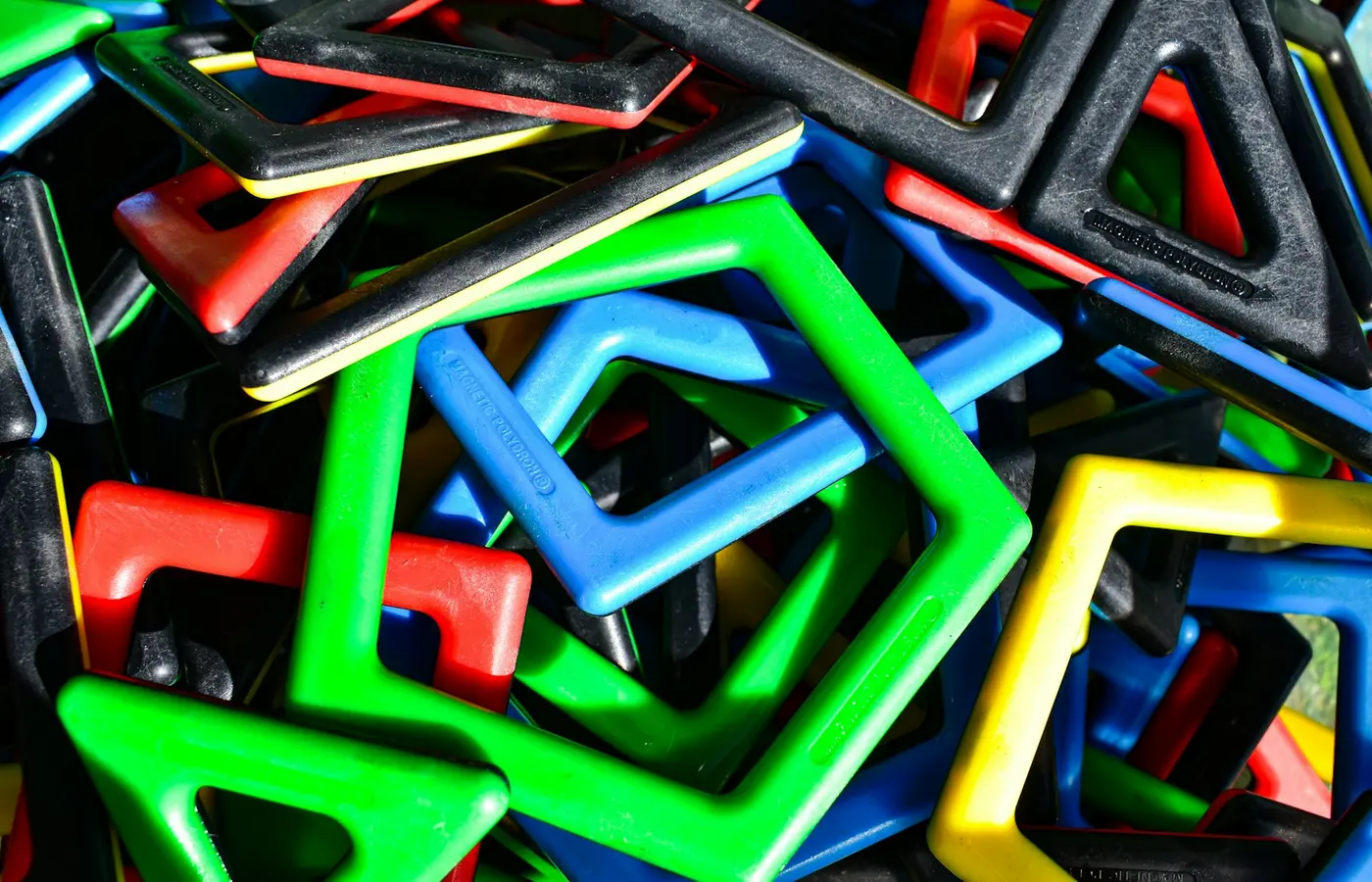 Magnetic tiles on a play mat